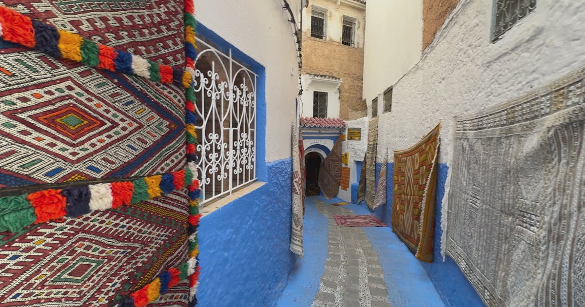 Blue-painted alleys of Chefchaouen at sunset